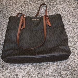 Brown Michael Kors purse and wallet